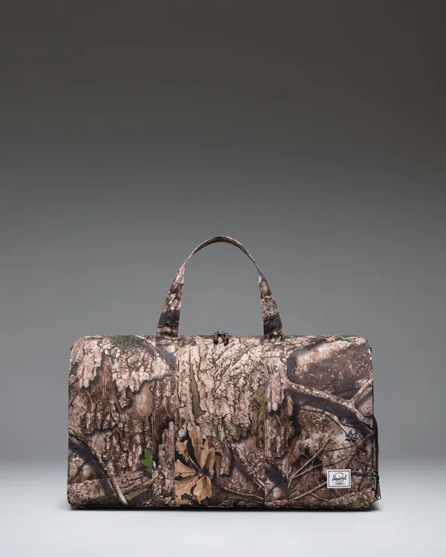 herschel-supply-novel-duffle-x-realtree-sac-de-voyage-camo-apx-avec-compartiment image 1