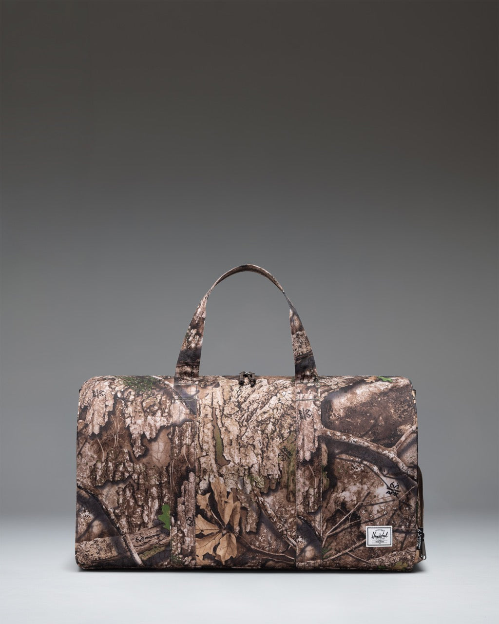 herschel-supply-novel-duffle-x-realtree-sac-de-voyage-camo-apx-avec-compartiment image 1